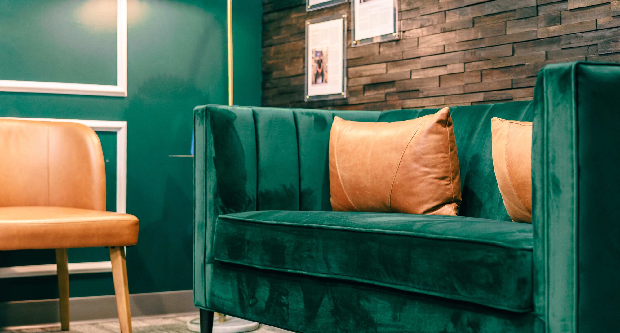 doctor talking to patient sitting in a dental chair